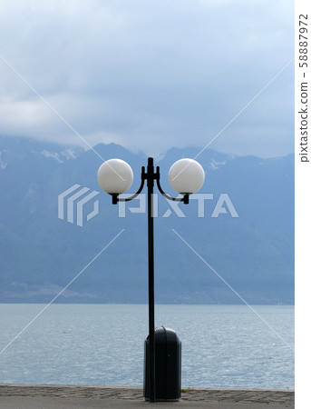 View of Lake Geneva and the Alps from the city of Montreux, Switzerland View of Lake Geneva and the Alps from the city of Montreux, Switzerland 58887972