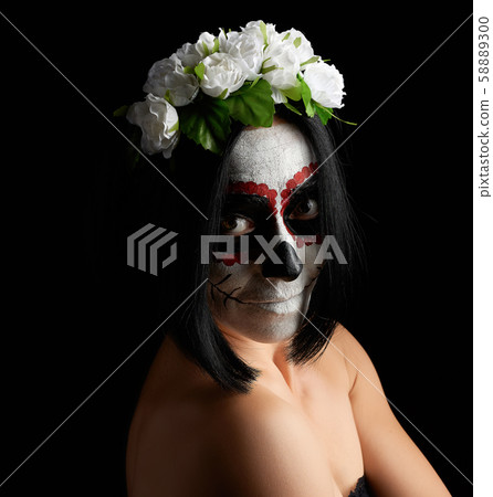 Young beautiful girl with traditional mexican 58889300