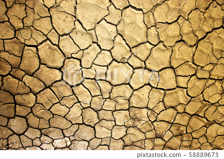 The ground is brown caused by drought The ground is brown caused by drought 58889673