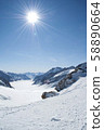 Swiss snow mountain and sun 58890664