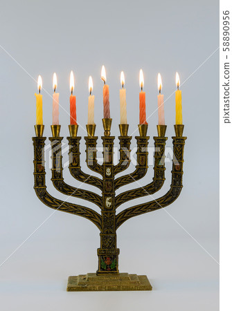 A symbolic candle lighting for the Jewish holiday A symbolic candle lighting for the Jewish holiday 58890956