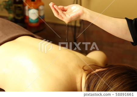 Ayurvedic esthetician hand 58891661