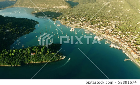 Aerial view of Nydri town. Lefkada Island, Greece Aerial view of Nydri town. Lefkada Island, Greece 58891674