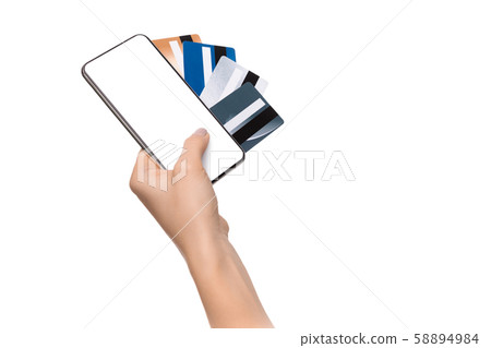 Woman's hand holding smartphone with blank screen and credit cards Woman's hand holding smartphone with blank screen and credit cards 58894984