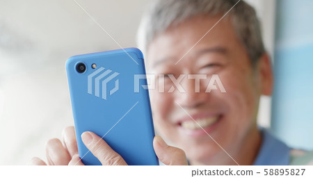 elder man use smart phone elder man use smart phone 58895827
