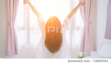 asian woman stretch her body 58895981