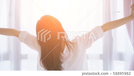 asian woman stretch her body 58895982