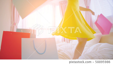 woman shopping and  jump 58895986