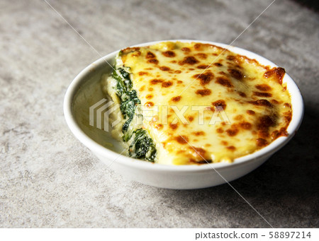 Spinach lasagna with cheese Italian food style , 58897214