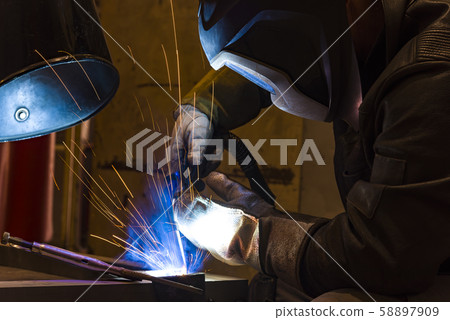 Industrial steel welder in factory welder, 58897909