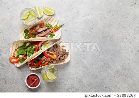 Mexican tacos and caipirinha cocktail 58898267
