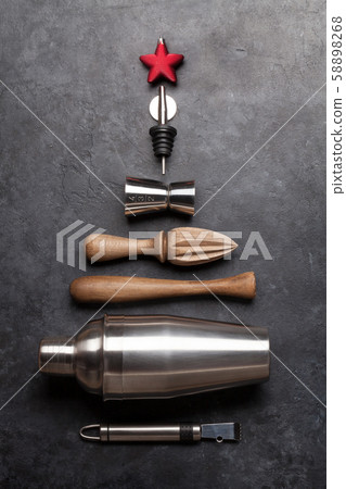 Set of bar tools on stone table 58898268