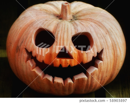 Carved Pumpkin Halloween Face Carved Pumpkin Halloween Face 58903897