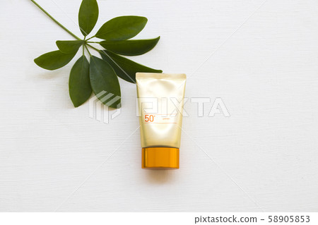 natural cosmetics for skin face sunscreen spf50  health care surface of lifestyle woman with leaf  58905853