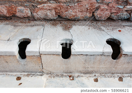 Antique marble public toilet in the city of 58906621
