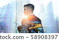 Portrait of relaxed businessman in modern 58908397
