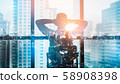 Portrait of relaxed businessman in modern 58908398