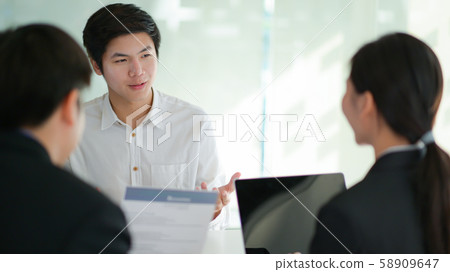 Concept applying work,Interviewing job seeker presenting their resume for executives to consider. Concept applying work,Interviewing job seeker presenting their resume for executives to consider. 58909647