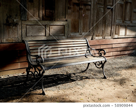 old wooden chair on the in front of the wall wood 58909844