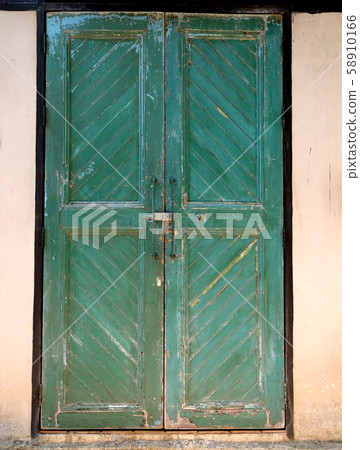 green wood door classic in an old building green wood door classic in an old building 58910166