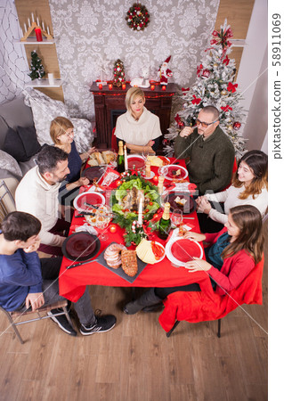 Top view of the table while family celebrating Christmas together 58911069