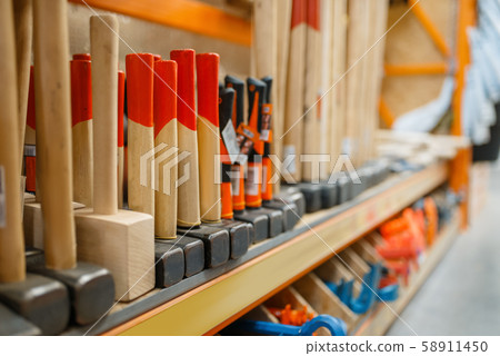 Hardware store assortment, shelf with hammers Hardware store assortment, shelf with hammers 58911450