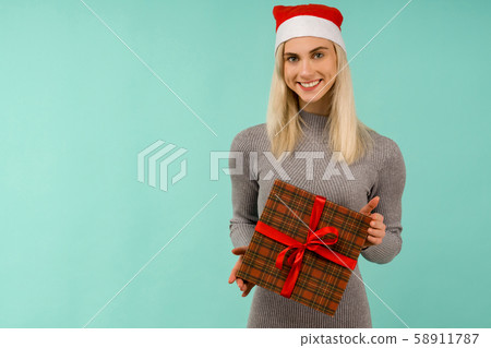 A beautiful smile sexy girl in New Year's hat and 58911787