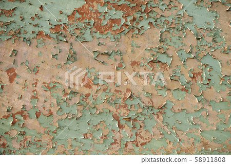 Textured wall with colorful paint, parts falling 58911808