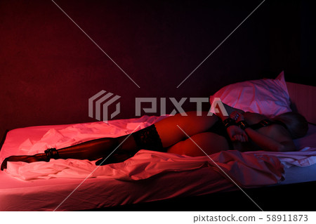 Beautiful sexy lady in bdsm outfit. Woman with Beautiful sexy lady in bdsm outfit. Woman with 58911873