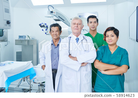 Confident multi-ethnic medical workers Confident multi-ethnic medical workers 58914623