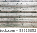 Old rustic fence with wooden texture for background in horizontal position. 58916852