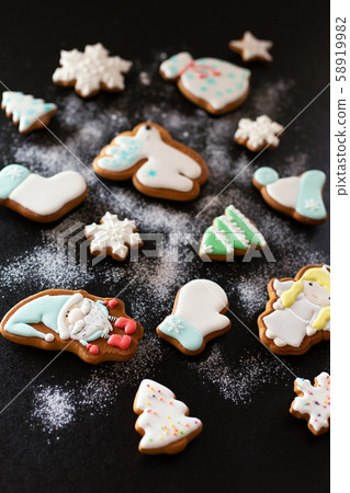 Christmas gift gingerbread on dark background. 58919982