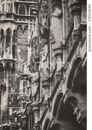 Elements of architecture and statues of the new city hall on Marienplatz in the center of Munich.  58920946