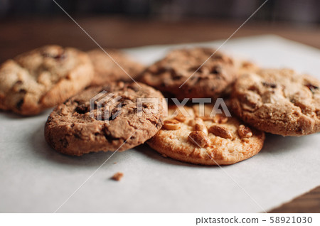 Chocolate cookies on wooden table. Chocolate chip Chocolate cookies on wooden table. Chocolate chip 58921030