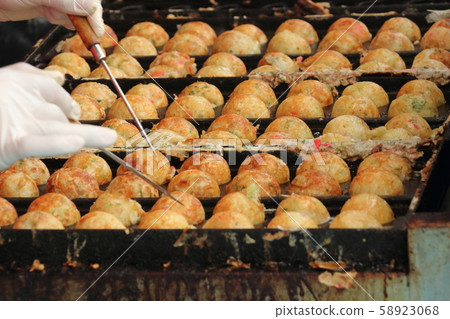 Takoyaki, freshly baked, hot takeout, takeaway Takoyaki, freshly baked, hot takeout, takeaway 58923068