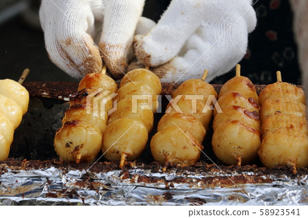 Grilled dumplings, freshly baked, soy sauce sauce, takeout Grilled dumplings, freshly baked, soy sauce sauce, takeout 58923541