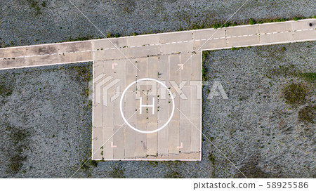 the helicopter is landing, the view from the top the helicopter is landing, the view from the top 58925586