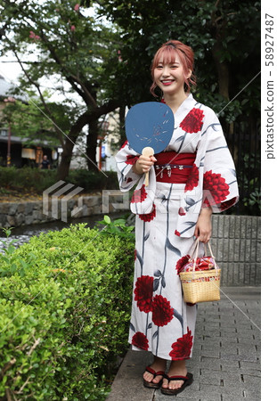 Yukata beautiful female college student walking around Kyoto Yukata beautiful female college student walking around Kyoto 58927487