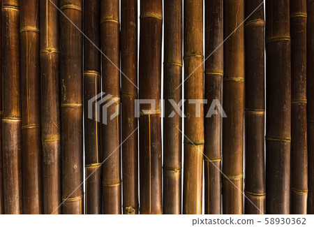 Bamboo twig wall as abstract background. Background of old bamboo Bamboo twig wall as abstract background. Background of old bamboo 58930362