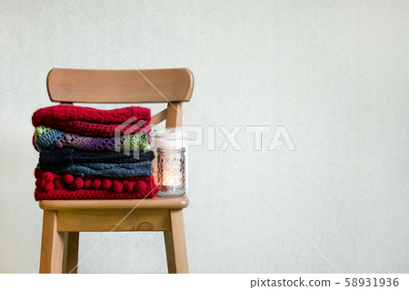 Stack of cozy knitted sweaters and other cloth, Stack of cozy knitted sweaters and other cloth, 58931936