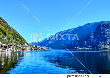 Hallstatt is a completely amazing town in Austria, hidden between the mountains and Lake Hallstatt is a completely amazing town in Austria, hidden between the mountains and Lake 58932159