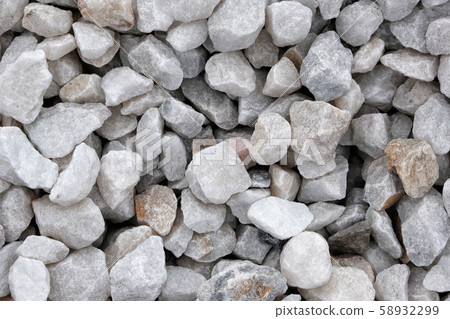 Decorative stone construction crumb close-up macro photo of a stone designer background. Marble 58932299