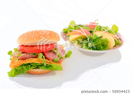 Delicious hamburger and salad Delicious hamburger and salad 58934423