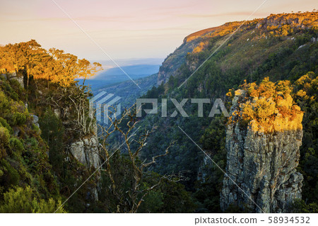 Stunning view of Pinnacle Rock, a large quartzite column rising from a deep gorge in Blyde River Canyon nature reserve, Mpumalanga province, South Africa 58934532