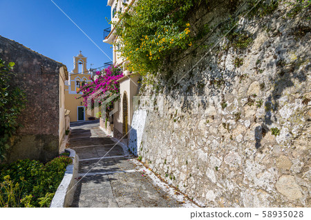 In the streets of Pelekas village on Corfu island 58935028
