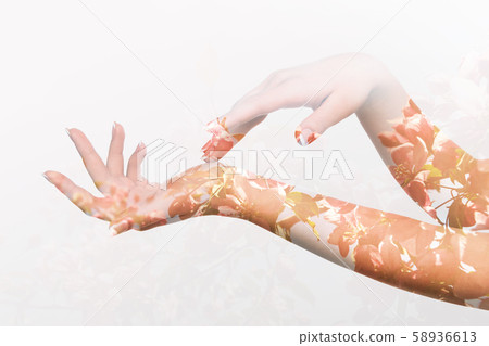 Double exposure effects on silhouette of two female hands Double exposure effects on silhouette of two female hands 58936613