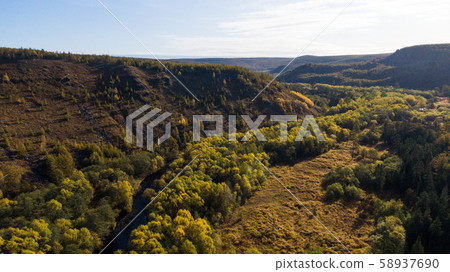 Top view of the taiga forest, river, road . The vast expanses of Eastern Siberia. far East Russia 58937690