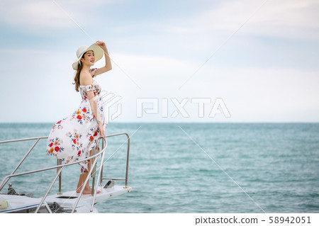 Travel woman relax on sailboat 58942051