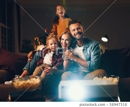family mother father and children watching 58947318