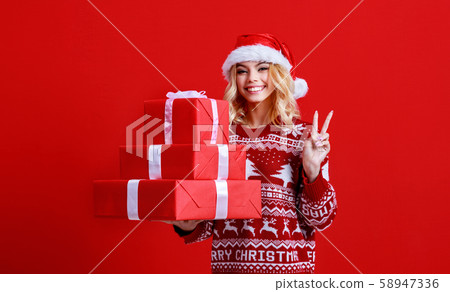 happy young cheerful girl laughs and jumps in happy young cheerful girl laughs and jumps in 58947336